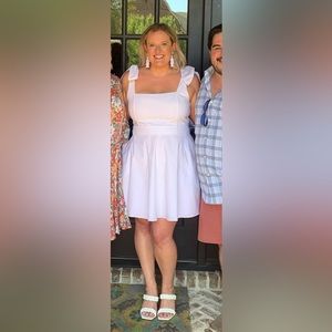 Show Me Your MuMu, white mini dress with bow sleeves and pockets. Size XL.